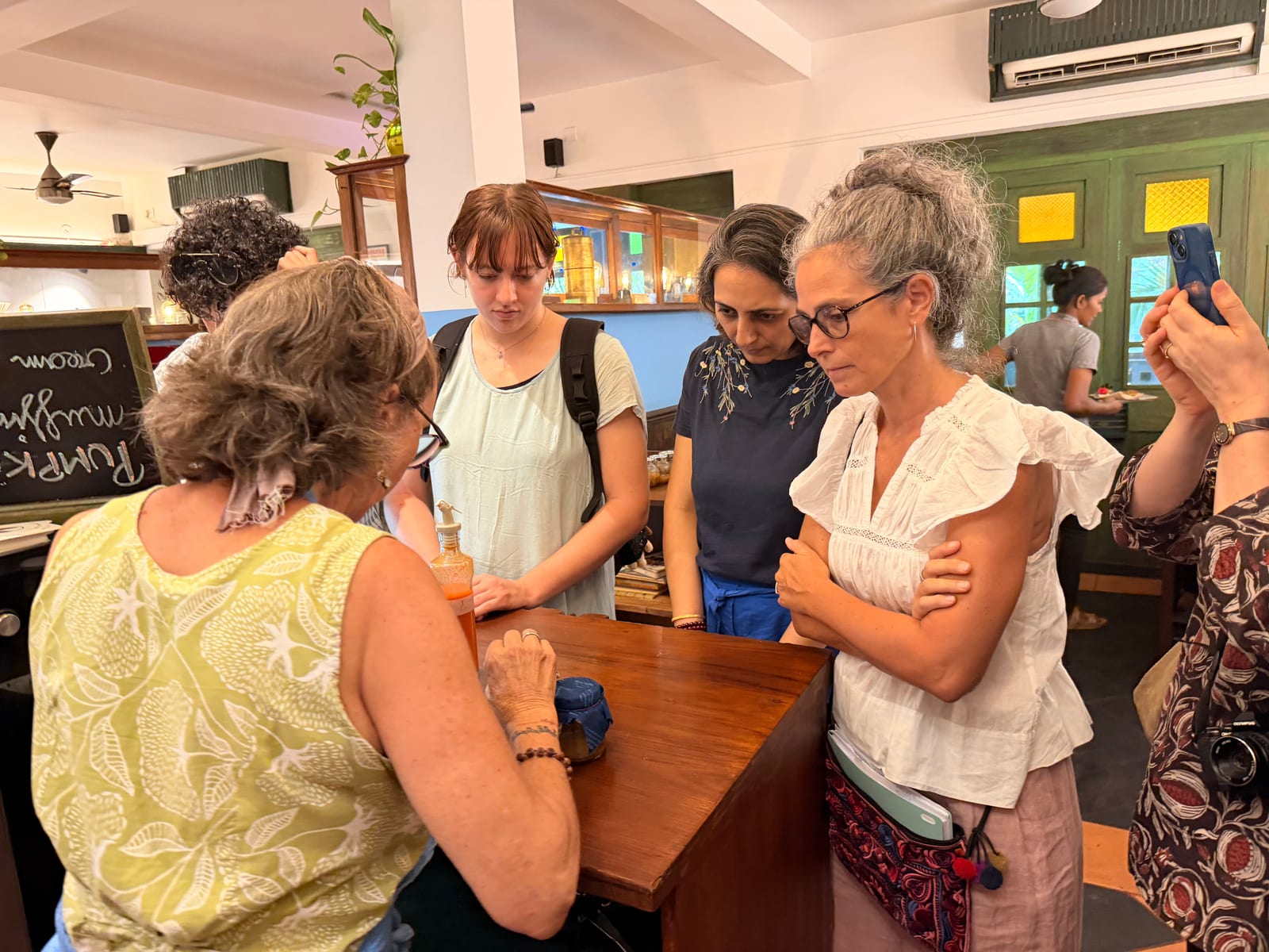 The fermentation class gathered around the counter, watching Matilda demonstrate